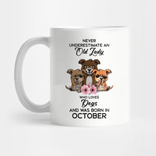 Never Underestimate An Old Woman Who Loves Dogs And Was Born In October Mug